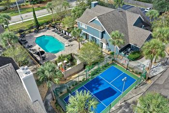 Aerial view of pool and court